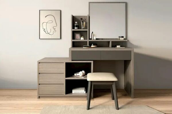 A modern vanity with a mirror and stool.
